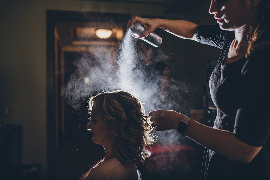Mobile hair design artist from Beauty on Location Studio styling a Colorado bride